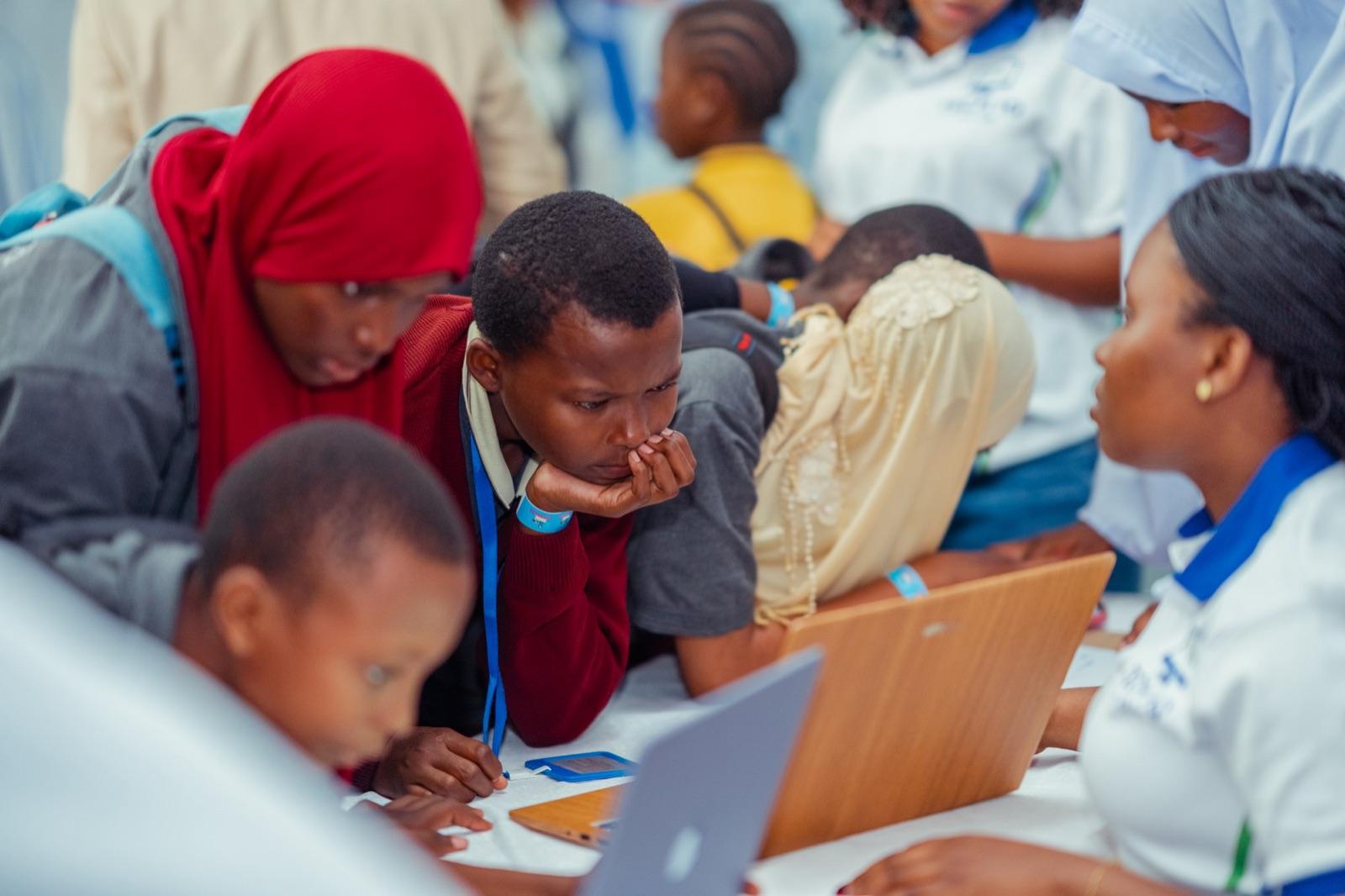 Students following a TECH IQ instructor's explanation