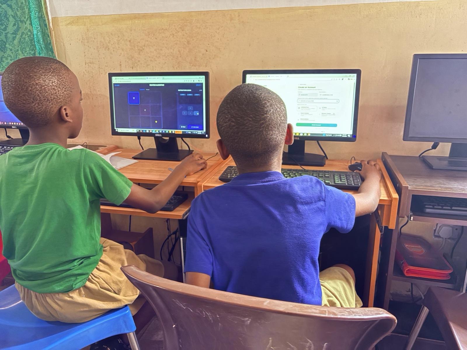 Two pupils working through SmartEdu activities side by side