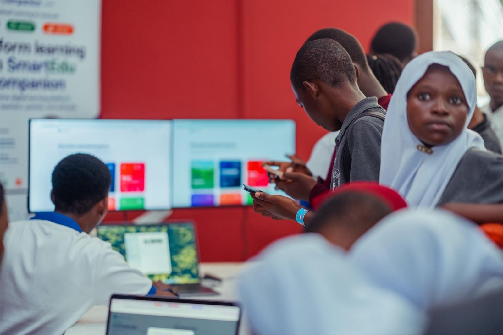 Students exploring SmartEdu Companion on large screens
